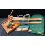 A lawn croquet set, soft carry case; a bagatelle game; a Dryad guillotine (3)