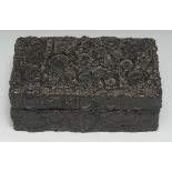 An unusual late 19th century rectangular box, decorated overall with seal impressions, hinged cover,