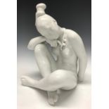 A Bing and Grondahl figure, female nude seated cross legged, white gloss glaze, number 2281, 24.5cm,