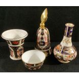 A Royal Crown Derby Imari 1128 pattern flared miniature vase, 6.5cm; a miniature sugar bowl; a