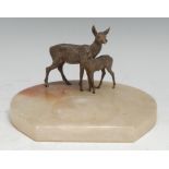 An Austrian cold painted bronze group, a deer and faun, mounted on an onyx dish, 16.5cm wide,