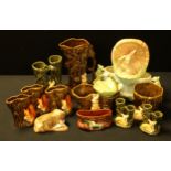 A collection of Sylvac pixie and wildlife jardinieres and vases, various