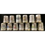 A set of thirteen Royal Doulton Brambly Hedge thimbles, The Seasons and others (13)