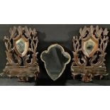 A pair of Victorian carved wood shelf brackets with mirrors, 29cm high; a gilt framed shaped