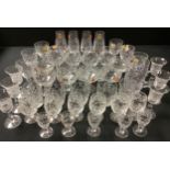 A set of six Webb Corbett "Georgian" wine glasses, six Webb Corbett coupe glasses, four brandy