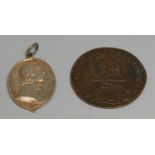 King Charles the Martyr - a silver-gilt coloured metal commemorative pendant medallion, in relief