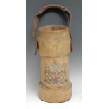 An early 20th century canvas artillery shell carrier, decorated with Royal coat of arms, leather