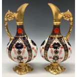 A pair of Royal Crown Derby Imari 1128 pattern Kedleston ewers, 26cm, printed marks, second quality