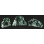 A suite of three Kosta Boda 'iceberg' etched glass sculptures, each intaglio cut with Polar bears,