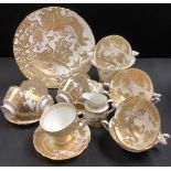 A Royal Crown Derby Gold Aves vase; eight teacups; five soup bowls, bread and butter plate, etc