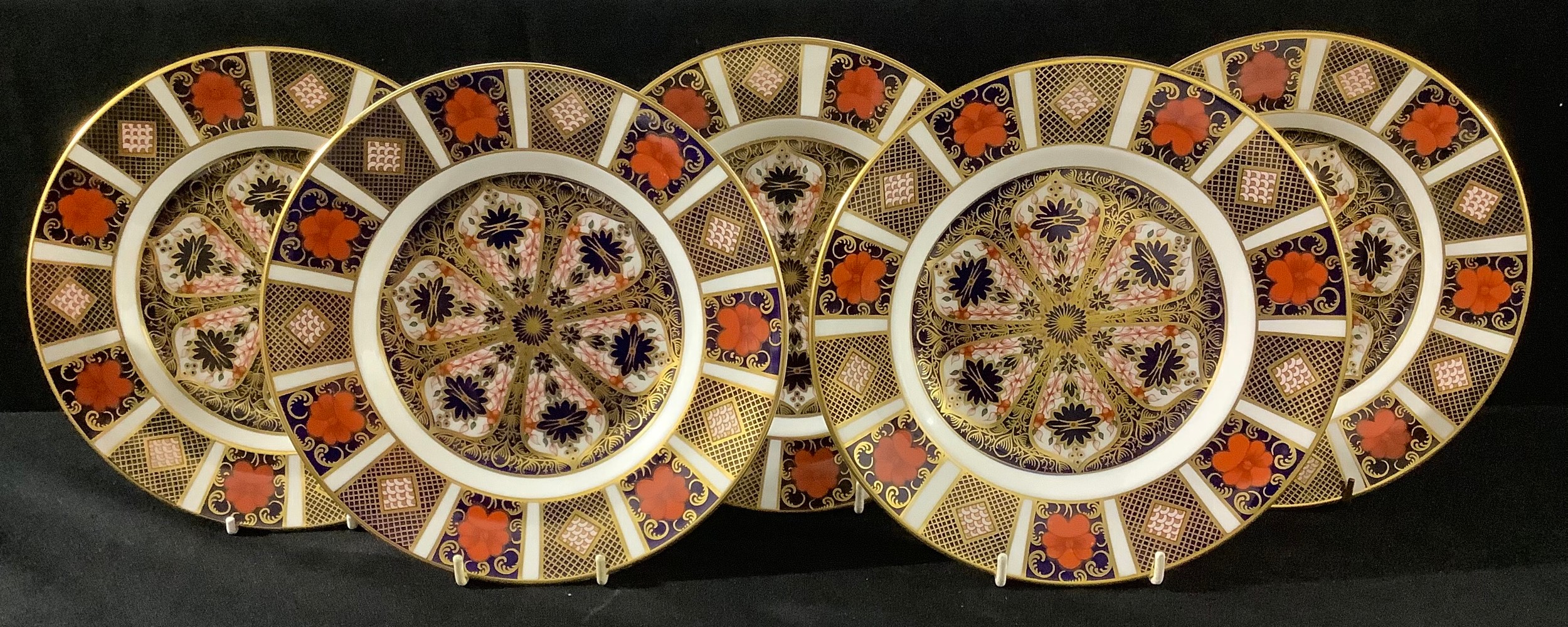 A set of four Royal Crown Derby Imari 1128 pattern side plates, 21.5cm, seconds; another, first