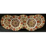 A set of four Royal Crown Derby Imari 1128 pattern side plates, 21.5cm, seconds; another, first