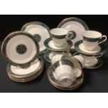 A Royal Doulton Carlyle pattern tea set, seven cups and saucers, seven tea plates, pair of