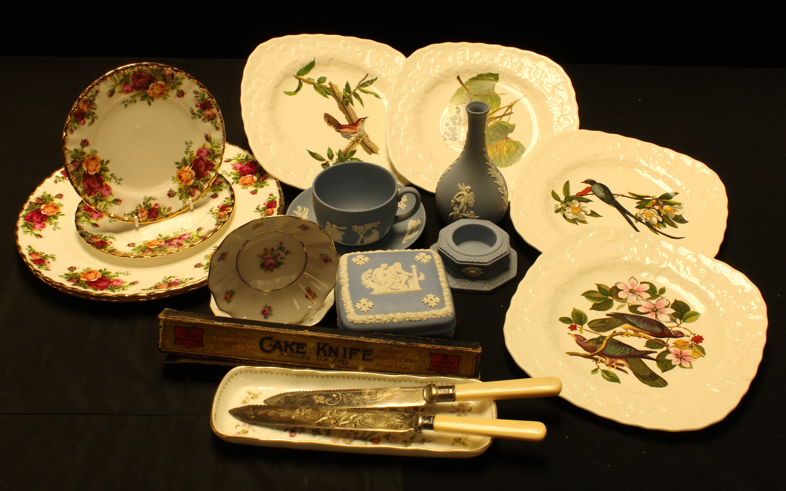 Ceramics - a Wedgwood blue Jasperware teacup and saucer; bottle vase; trinket box; Wedgwood