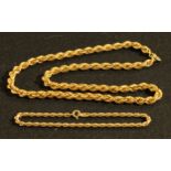 A 9ct gold rope twist necklace; a similar bracelet, 30g