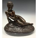 A French dark patinated bronze, after Mme. Leon Bertaux, female nude reclining, signed in the