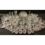 Glassware - a selection of Tutbury Crystal cut glass vases, pots and covers, miniature teapot milk &