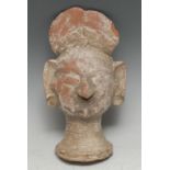 Antiquities - an Indian terracotta sculptural fragment, as a female head, traces of geometric