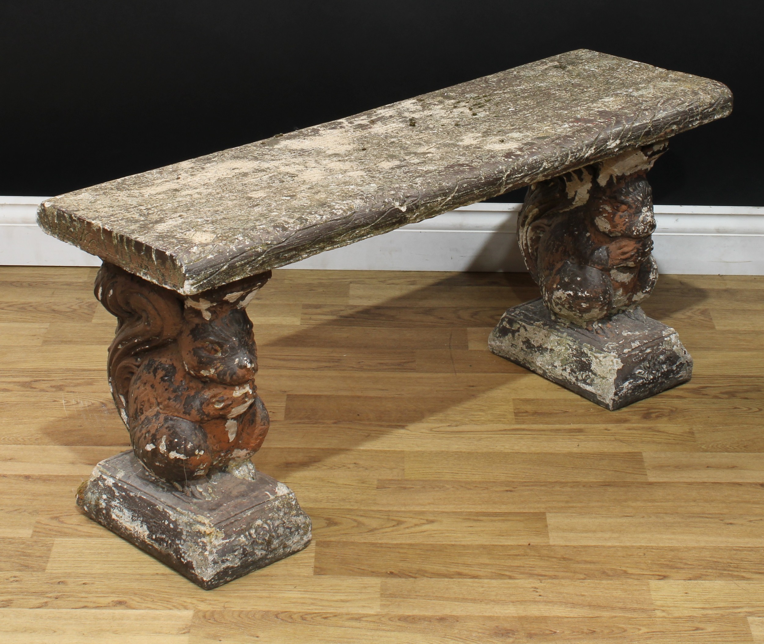 A reconstituted stone garden bench, the end supports cast as squirrels, 44cm high, 101cm wide, - Image 2 of 2