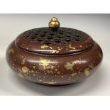 A Chinese gold splash bronze censer and cover, 14cm diam, seal mark