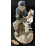 A Lladro figure, of an Old Sailor and a Young Boy, 29cm high, printed mark