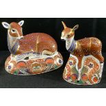 A Royal Crown Derby paperweight, Collectors Guild, Deer, gold stopper, boxed; a similar fawn (2)