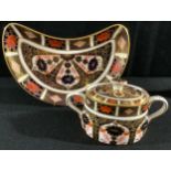 A Royal Crown Derby Imari 1128 pattern sucrier and cover, an 1128 crescent shaped salad dish,