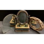 An oval driftwood mirror, 40cm high; a painted dressing table mirror with jewellery drawer, 48cm