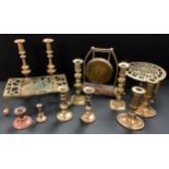 Metalware - a pair 19th century brass ejector candlesticks; other candlesticks; a brass gong;