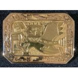 An 18ct Gold canted rectangluar 'Aztec' brooch, engraved and chased (with what), stamped 18ct,