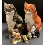 A Babbacombe Pottery Ginger cat; another Tabby; Beswick Cheshire Cat, LC3; Beswick grey kitten;