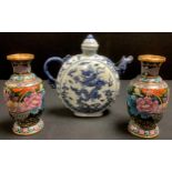 A pair of Chinese cloisonne vases, 15cm; a blue and white moon flask teapot with elephany spout,