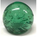 A large Victorian green glass dump, bubble inclusions, c.1880