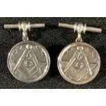 A pair of silver masonic cufflinks