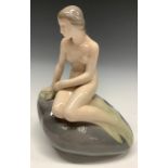 A Royal Copenhagen figure, The Little Mermaid, modelled by Edvard Eriksen, number 4431, 22cm,