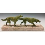 A French spelter model of two hunting hounds, in verdigris tones, rectangular marble base, 51cm