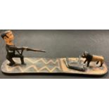 Tribal Art - a carved wooden hunting group, 66cm wide, 26cm high