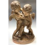 A French terracotta cherub group, after Falconet, 28cm wide, 40cm high