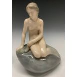 A Royal Copenhagen figure, The Little Mermaid, modelled by Edvard Eriksen, number 4431, 22cm,