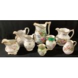 English Porcelain - a collection of eight 19th century and later jugs, various, mostly painted