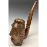 A large tobacco pipe, carved as a Native American, possibly a tobacconist's advertising novelty