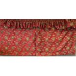 A pair of brushed cotton curtains, with large flowerheads on a red ground, 67in drop, width 106in