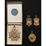 A 9ct gold pocket watch chain fob; two others, each 9ct, 10.8g gross combined; a silver pendant/fob,