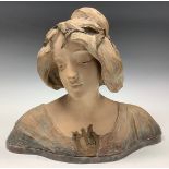 A French terracotta bust of an Art Nouveau beauty, hand painted, 40cm x 34cm