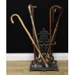 A cast metal walking stick or umbrella stand, of Coalbrookdale inspiration, 58cm high, 42cm wide,