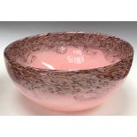 A Vasart type opaque glass bowl in swirls of pink flecked with purple and gold inclusions, 20cm
