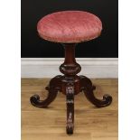 A Victorian cabriole leg piano stool