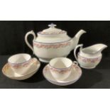 An early 19th century English porcelain part-tea set, pattern no. 15, comprising a boat-shaped