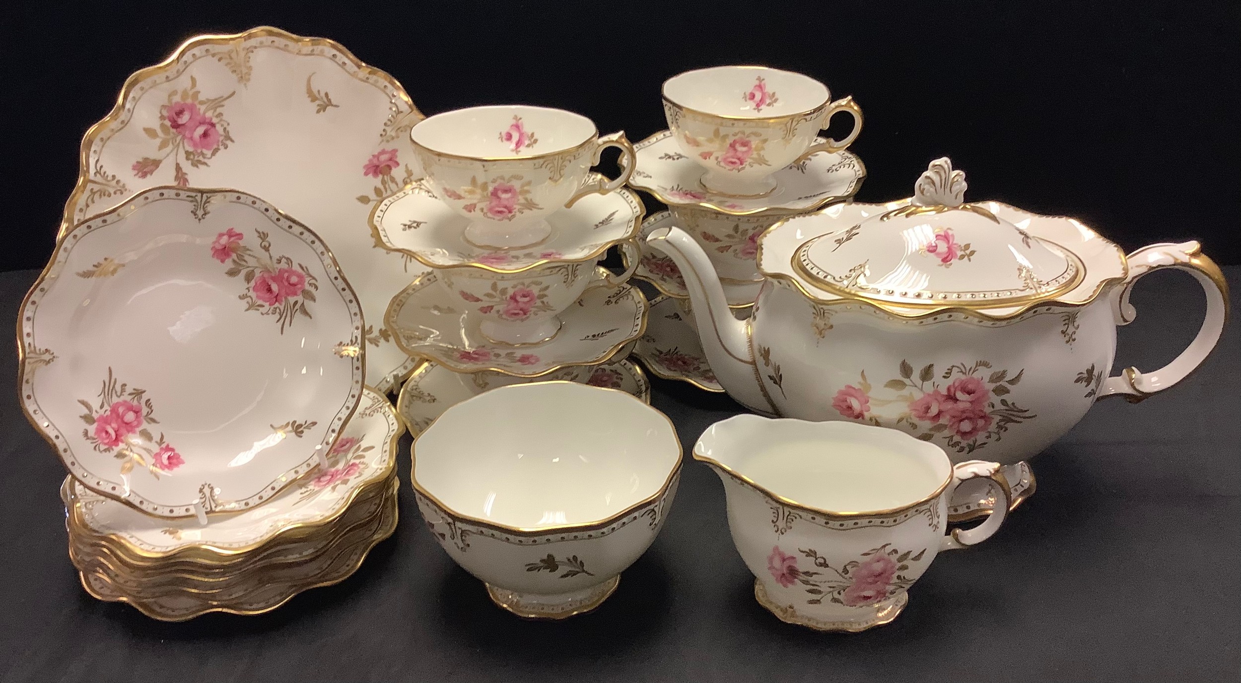 A Royal Crown Derby Royal Pinxton Roses pattern large teapot, milk jug, sugar bowl, six teacups