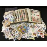 Stamps - a quantity of stamps in box and three albums, Pelham, Strand and Movaleaf all packed with